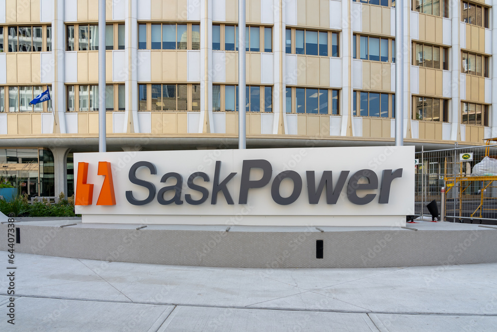 SaskPower logo and sign in front of SaskPower headquarters building in Regina, Saskatchewan