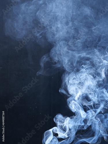 White smoke on black background