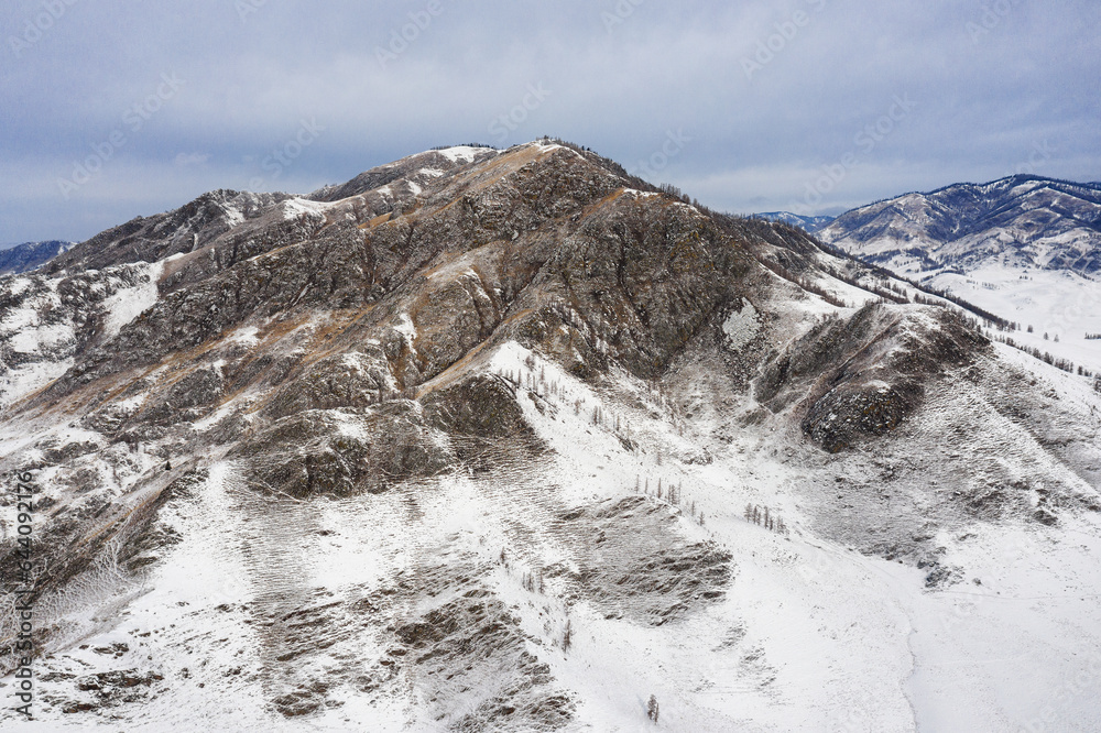 Altai Mountains in winter: Terektinsky ridge. Aerial view.