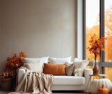 Autumn cozy home interior with candles, pumpkins and flowers