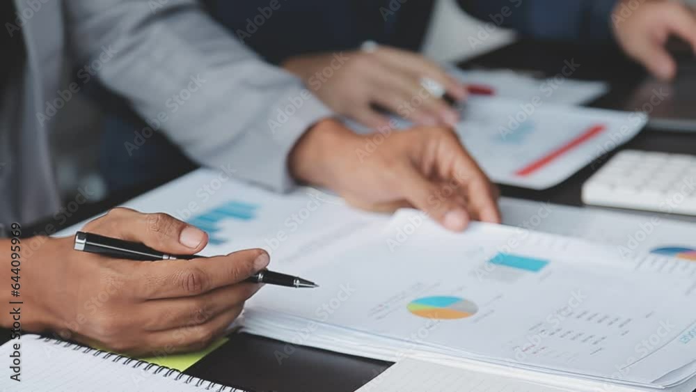 Close up of Business team analyzing income charts and graphs with modern laptop computer. Business analysis and strategy concept. Close up of Business team analyzing income charts and graphs with modern laptop computer. Business analysis and strategy concept.