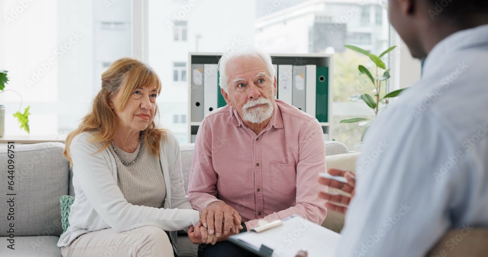 Obraz premium Counseling, support and senior couple with therapist in consultation for help, talk or crisis guidance. Therapy, depression and old people holding hands consulting marriage or mental health expert