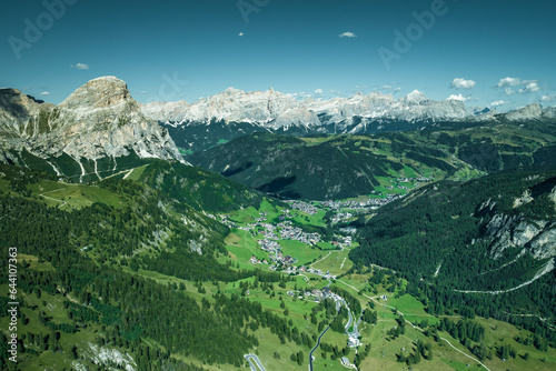 Aerial view of Colfosco town on Passo Gardena on the Dolomites Mountains, Trentino, South Tyrol, Italy. photo