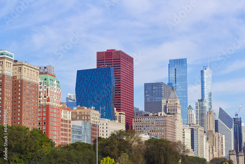Chicago cityscape skyline urban city downtown view panorama with skyscrapers, towers, trees and blue sky scenic landscape photo.