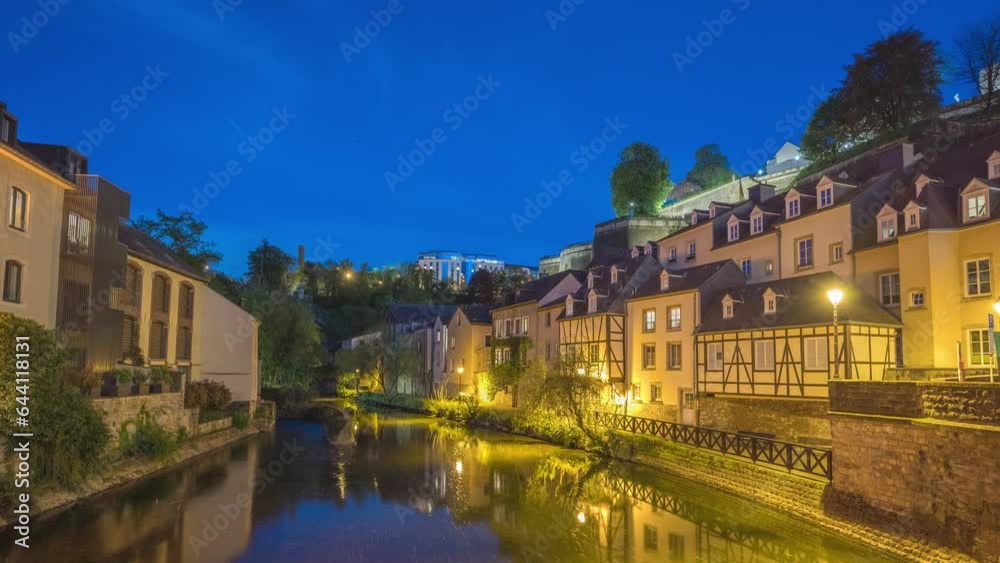 Grand Duchy of Luxembourg time lapse 4K, city skyline night timelapse at Grund along Alzette river in the historical old town of Luxembourg Grand Duchy of Luxembourg time lapse 4K, city skyline night timelapse at Grund along Alzette river in the historical old town of Luxembourg