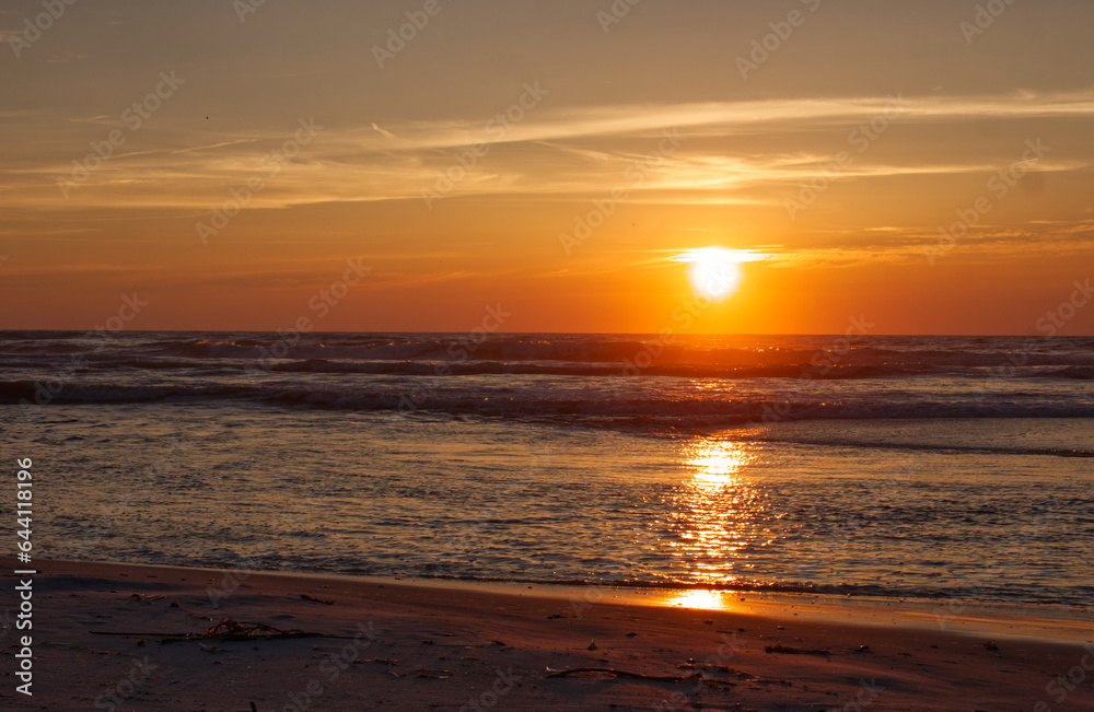 Naklejka premium sunset on the beach