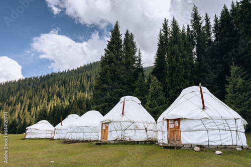 Yurt in Jeti Oguz Valley. National old house of the people of Kyrgyzstan and Asian countries. Yurts on the background of green meadows and highlands. Yurt camp for tourists.