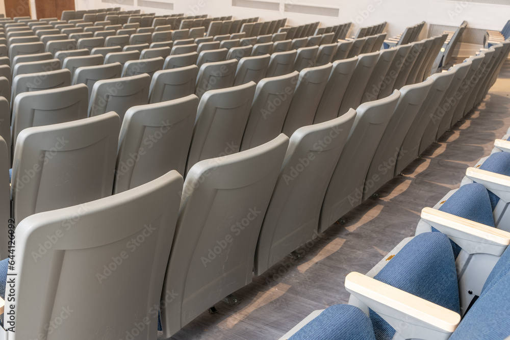 Fototapeta premium Empty gray and blue theater, auditorium seats, chairs.