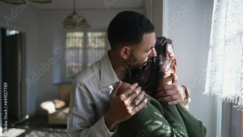 Empathetic boyfriend providing emotional support and comfort to his tearful girlfriend during a challenging period