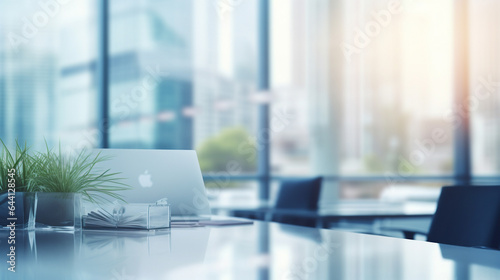 An elegant and minimalist blurred background image of a modern office with panoramic windows  creating a serene atmosphere.