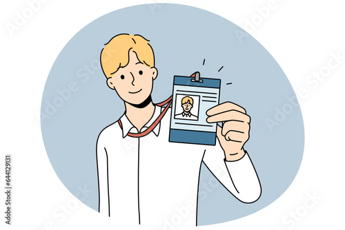 Businessman present ID card in office. Smiling male employee showing personal badge at workplace. Staff document. Vector illustration.