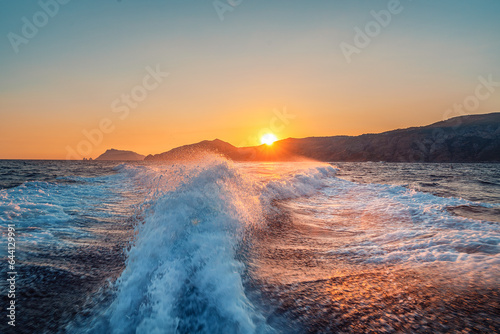 Sunset on the sea with waves and splashes between Capri and Positano  Amalfi coast  Italy