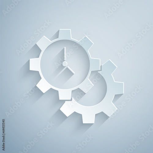 Paper cut Time Management icon isolated on grey background. Clock and gear sign. Productivity symbol. Paper art style. Vector