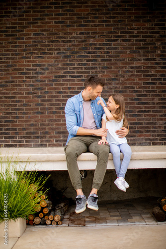 Father and his daughter hav...