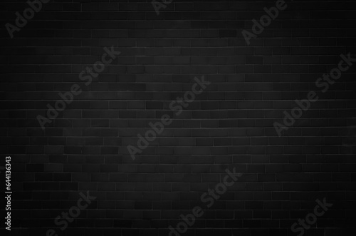wall old surface of the black stone texture rough, brick dark tone. Use this for wallpaper or background image. Paint black gradient texture ,night,emptiness, dream,shadow..