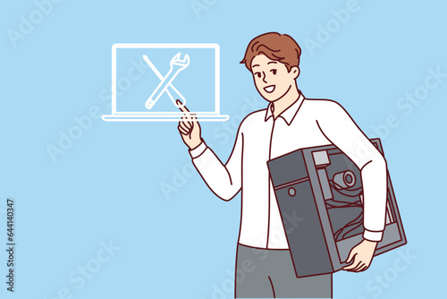 Man is computer repairman, holds disassembled system unit from PC, and recommends contacting warranty center. Guy is engaged in repairing computer, working as system administrator in office