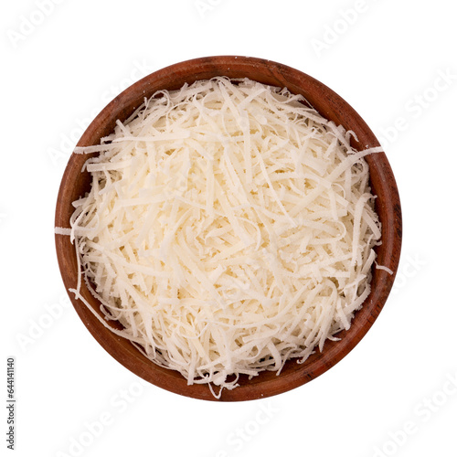 grated cheese parmesan in wooden bowl isolated on white background with clipping path, top view of slices cheese, italian food