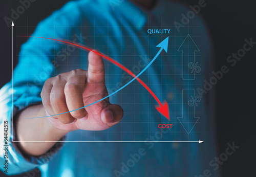 cost reduction concept Businessman with his hands lowering the arrow of the graph Cost text with down arrow, budget, cost management and the concept of efficiency