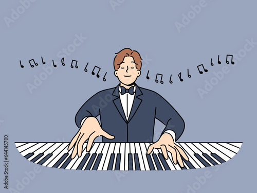 Man maestro plays piano with eyes closed and performs classical compositions in symphony orchestra. Happy maestro in tuxedo enjoys playing musical instrument and working in opera house.