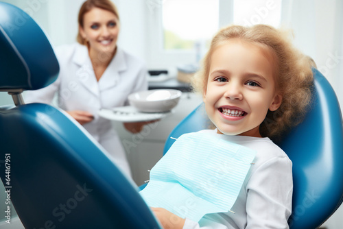 Generative AI photo of happy beautiful school aged child sitting on chair in dentist's office concept of dentist for the youngest patients