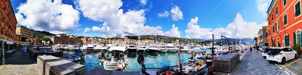 Photo of a picturesque harbor filled with colorful boats