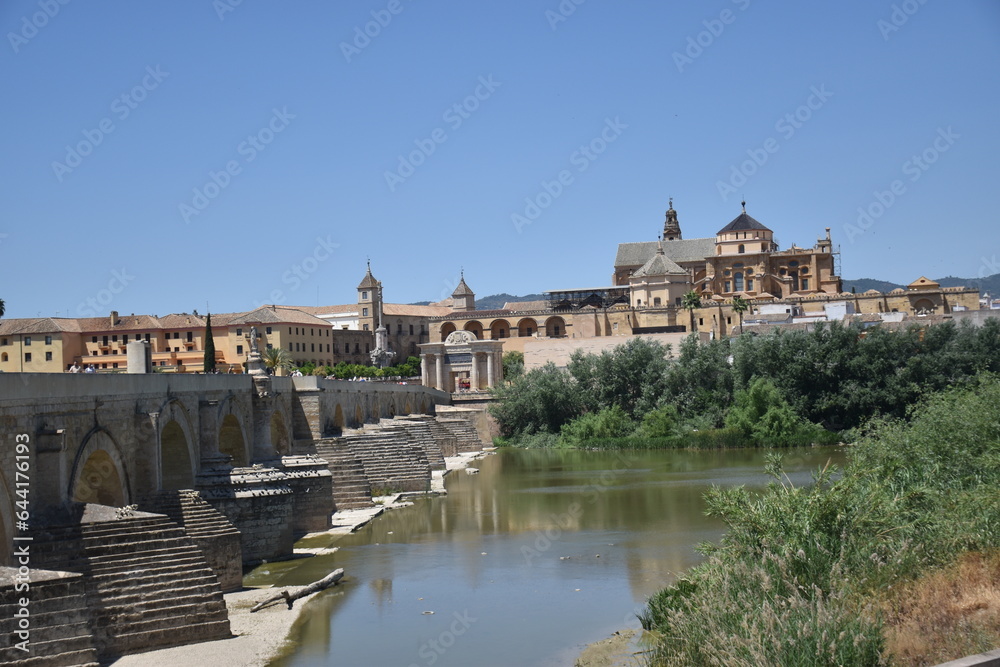 Panoramic from the Roman bridge to the Andalusian city of Cordoba in Spain