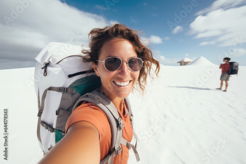 Happy traveler woman with b...