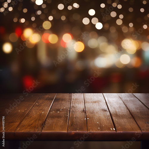 Empty wooden table top with blurred background with bokeh lights