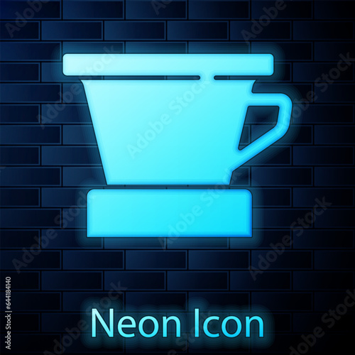 Glowing neon V60 coffee maker icon isolated on brick wall background. Vector