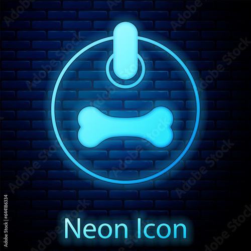 Glowing neon Dog collar with name tag and bone plaque icon isolated on brick wall background. Supplies for domestic animal. Cat and dog care. Pet dog chains. Vector