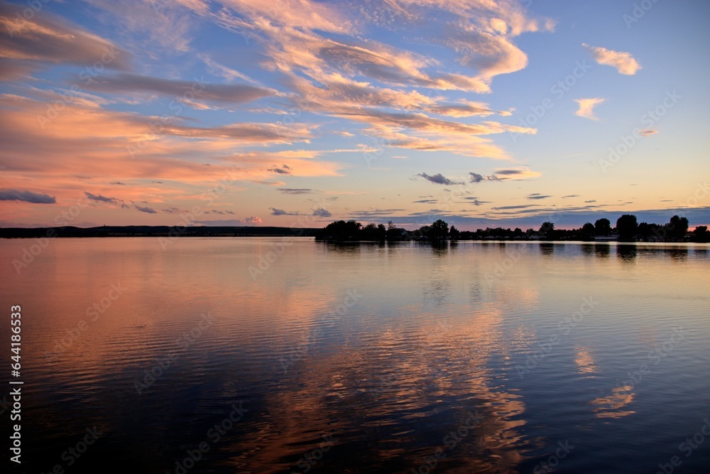 A stunning colorful sunset above the lake near Palava hills at South Moravia, Czech republic