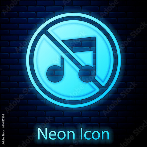 Glowing neon Speaker mute icon isolated on brick wall background. No sound icon. Volume Off symbol. Vector