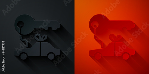Paper cut Car gift icon isolated on black and red background. Car key prize. Paper art style. Vector