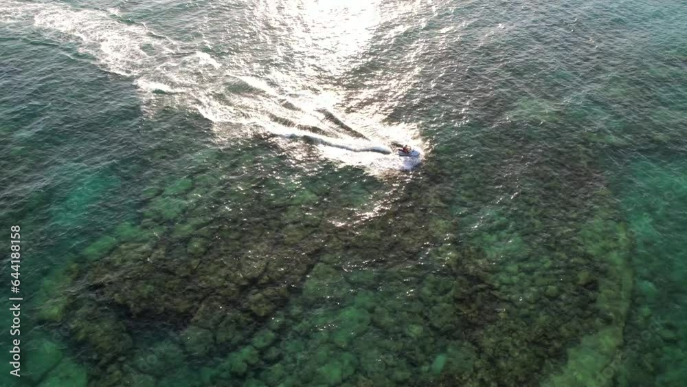 Jet Ski Overhead Aerial With Beautiful Turquoise Green Water Jet Ski Overhead Aerial With Beautiful Turquoise Green Water