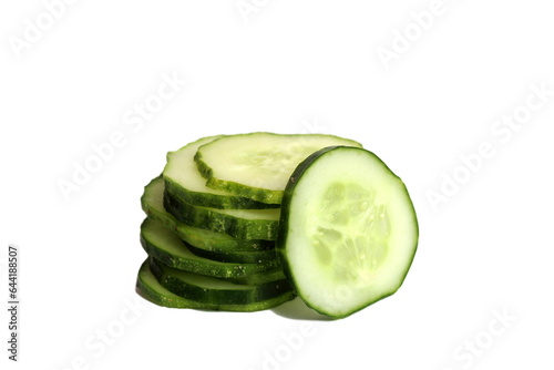  A bunch of sliced cucumbers in circles lie in one pile.