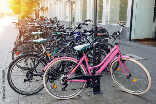 Modern bicycles parked on c...