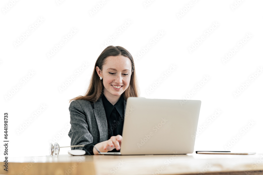 A woman uses a laptop computer, a secretary workplace in the office. An office employee is a financier in modern clothes. A woman uses a laptop computer, a secretary workplace in the office. An office employee is a financier in modern clothes.