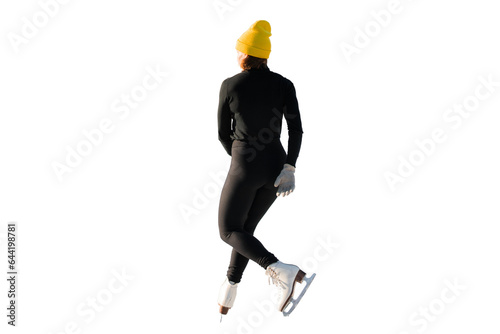 Одета в теплую спортивную одежду и желтая шапка. Здоровый образ жизни зимой.