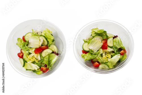 Salad with fresh vegetables isolated on a white background.