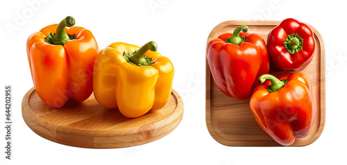 Set of Two Bell Pepper Orange, Yellow & Red on wooden plate, platter isolated on transparent background.