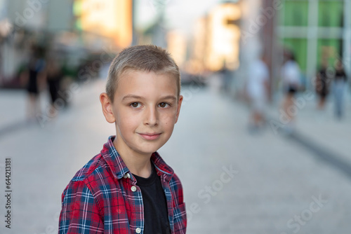 portrait of a young man on a city street