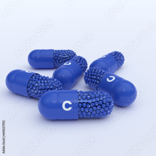 Vitamin C, Blue Capsules, Granules and Whtie Background