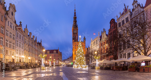 Decorated Christmas tree in festive illuminations at the Long Market in Gdansk at blue hour. Poland.