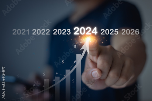 Analytical business people planning business growth 2024, strategy digital marketing, profit income, economy, stock market trends and business, technical analysis strategy. Business growing in 2024.