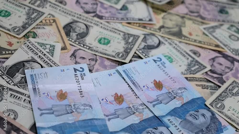 economy and finance with colombian money and american dollar economy and finance with colombian money and american dollar