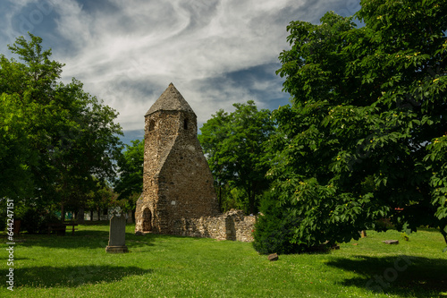 Ancient basalt tower of Avas church ruin at Szigliget near Lake Balaton, Hungary photo