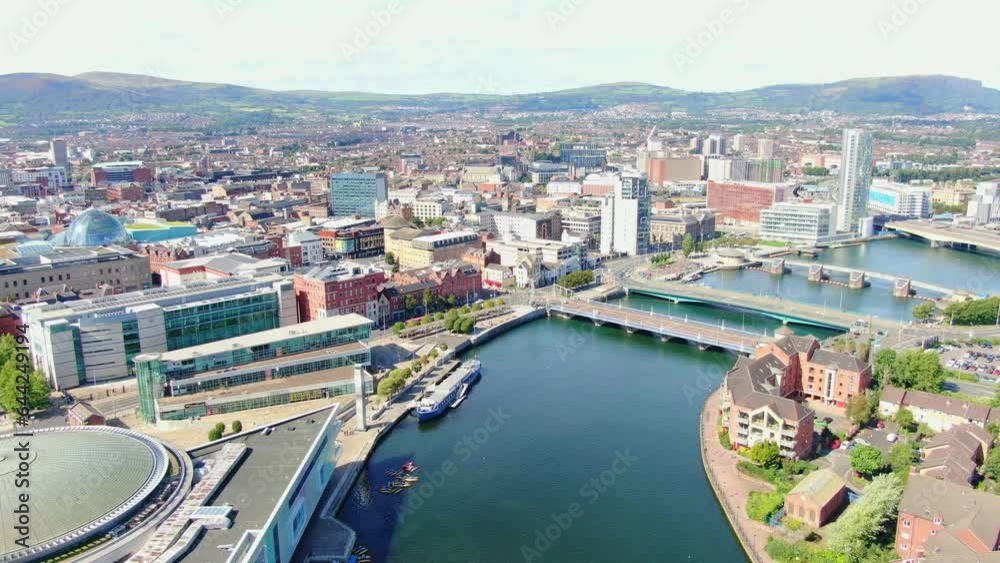 Aerial view on buildings and Lagan River in City center of Belfast Northern Ireland. Drone photo, high angle view of town