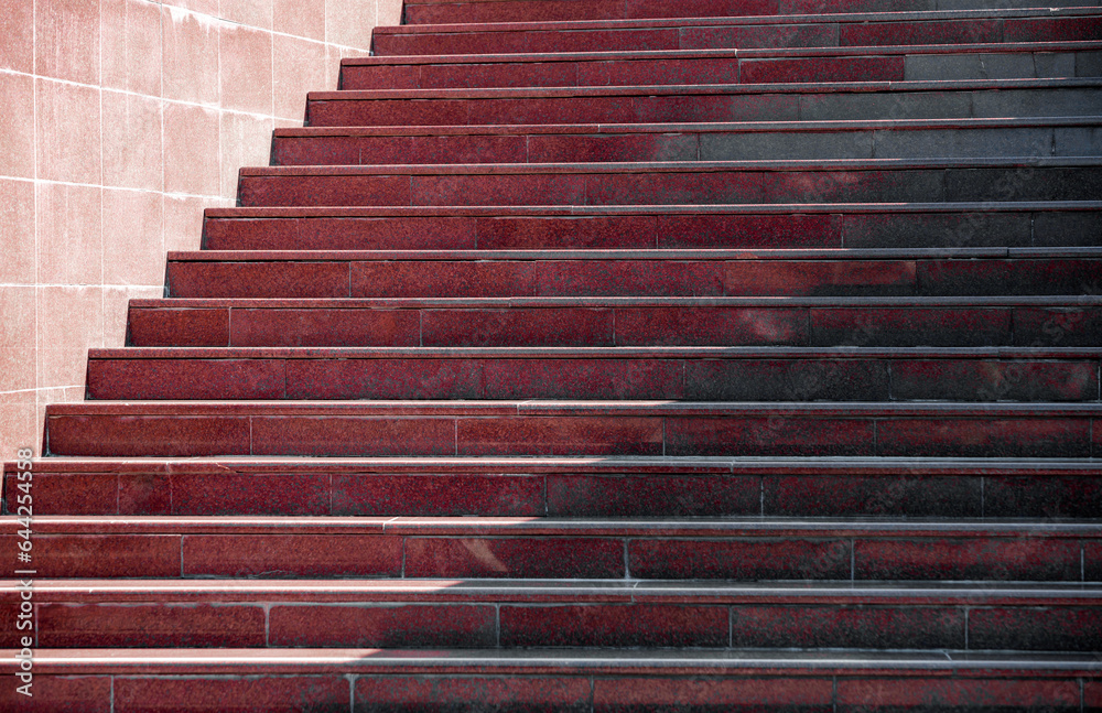 steps of an empty stone granite staircase close up steps of an empty stone granite staircase close up