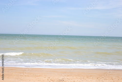 Sand beach with sea and sky. Holiday summer beach