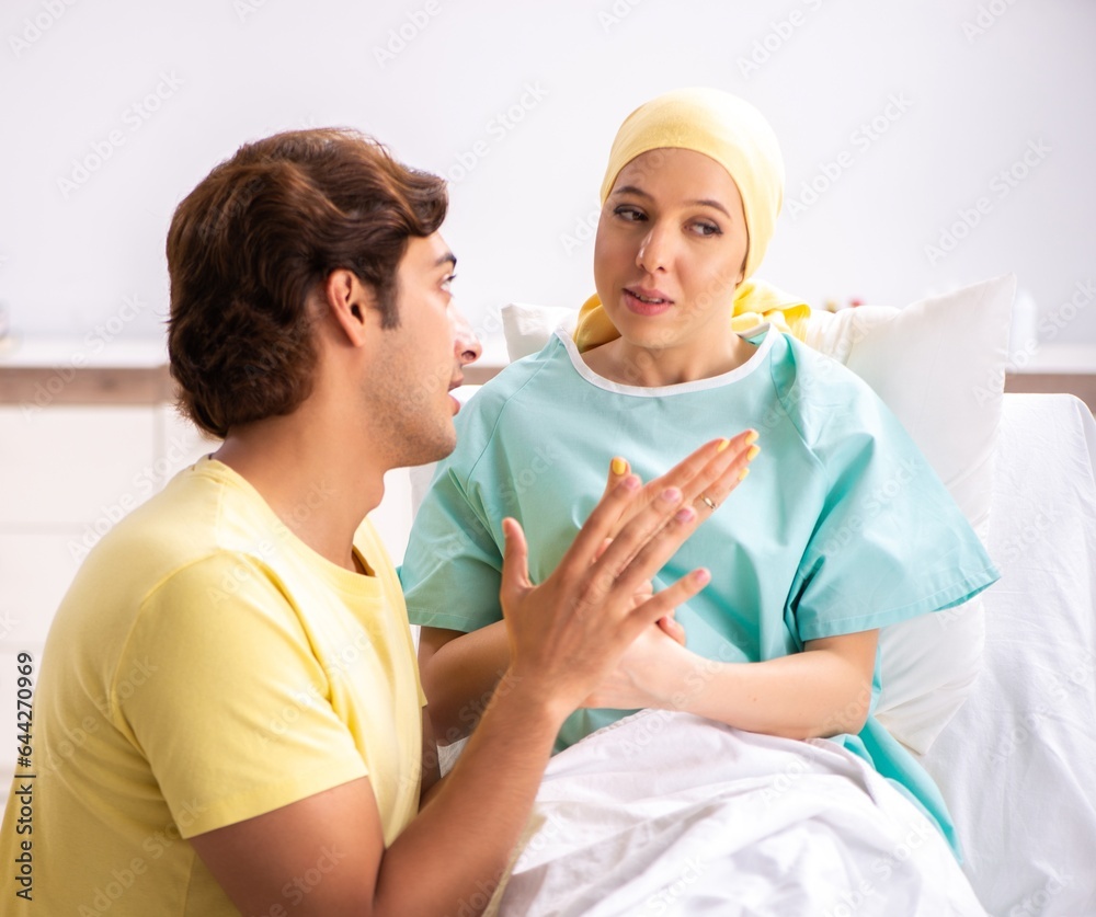 Husband looking after wife in hospital Husband looking after wife in hospital
